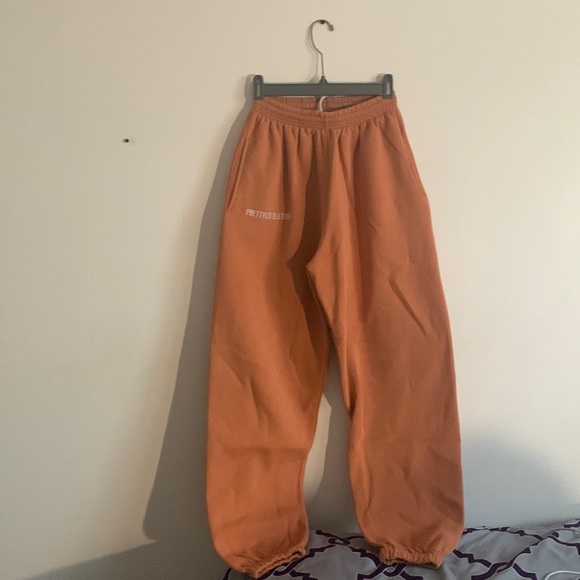 L | PLT Orange Joggers - Picture 1 of 5